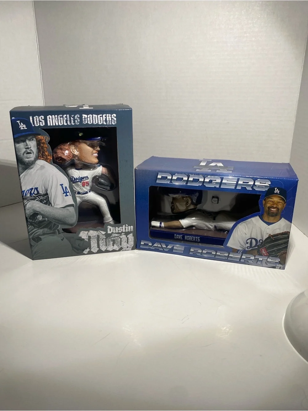 Dave Roberts and Dustin May bobble heads